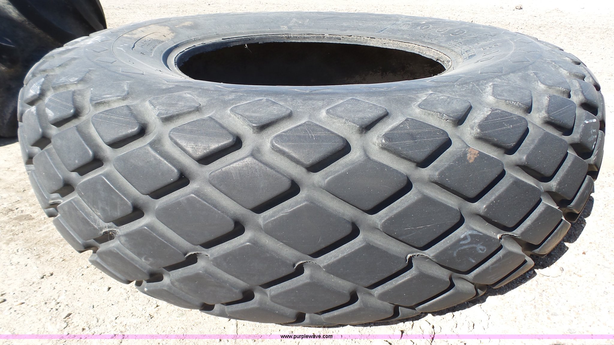 Goodyear 14.924 turf tire in Plainville, KS Item K4133 sold Purple Wave