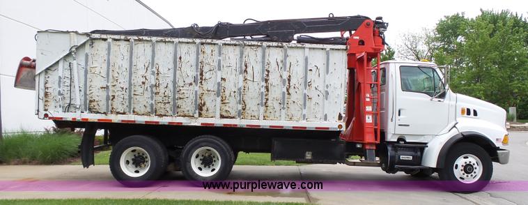 image for item AM9527 2004 Sterling L8500 Acterra Grapple truck
