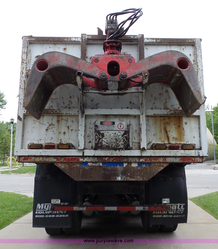 image for item AM9527 2004 Sterling L8500 Acterra Grapple truck