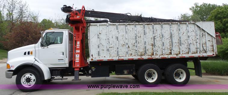 image for item AM9527 2004 Sterling L8500 Acterra Grapple truck