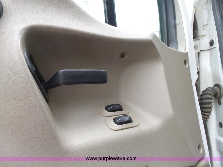 image for item AM9527 2004 Sterling L8500 Acterra Grapple truck