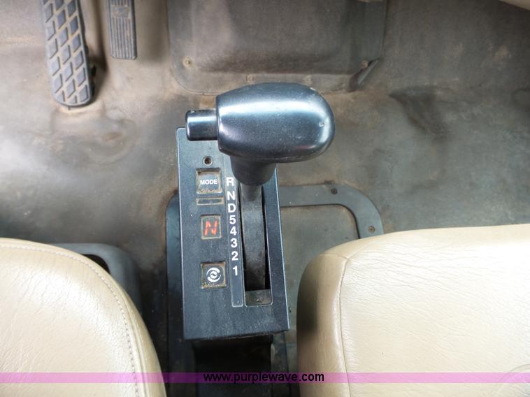 image for item AM9527 2004 Sterling L8500 Acterra Grapple truck