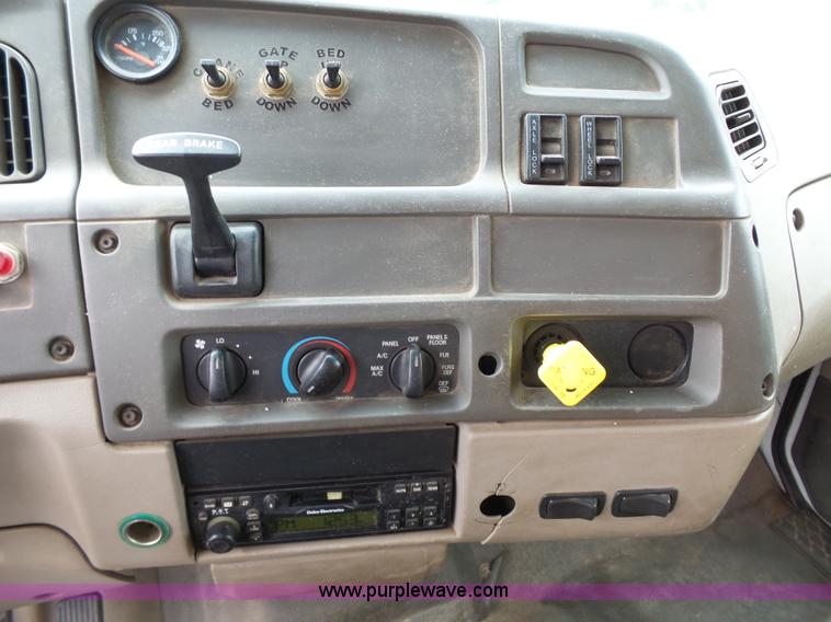 image for item AM9527 2004 Sterling L8500 Acterra Grapple truck