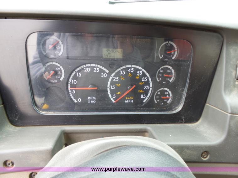 image for item AM9527 2004 Sterling L8500 Acterra Grapple truck