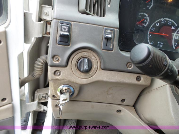 image for item AM9527 2004 Sterling L8500 Acterra Grapple truck