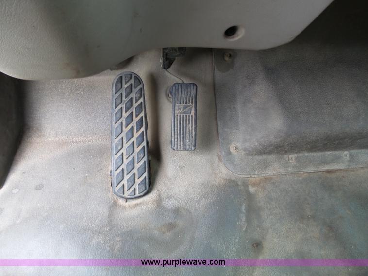 image for item AM9527 2004 Sterling L8500 Acterra Grapple truck