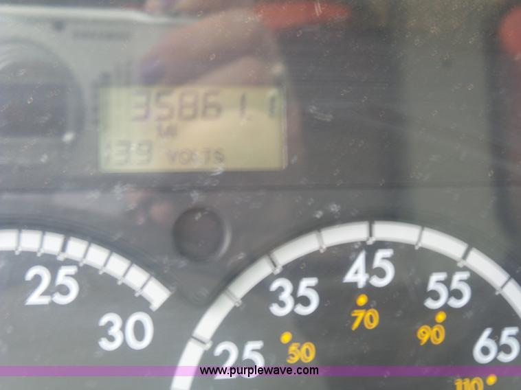 image for item AM9527 2004 Sterling L8500 Acterra Grapple truck