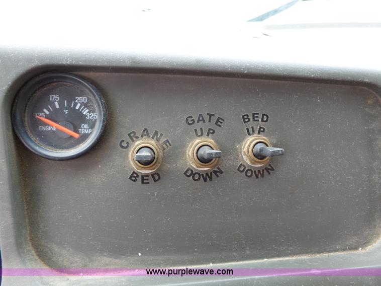 image for item AM9527 2004 Sterling L8500 Acterra Grapple truck