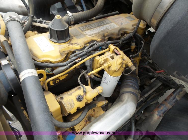 image for item AM9527 2004 Sterling L8500 Acterra Grapple truck