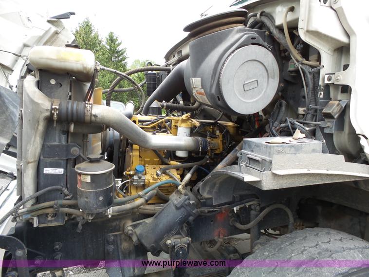 image for item AM9527 2004 Sterling L8500 Acterra Grapple truck