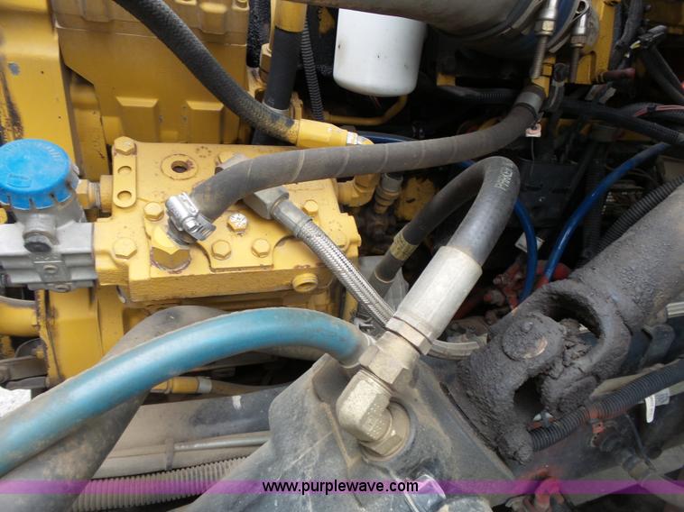 image for item AM9527 2004 Sterling L8500 Acterra Grapple truck