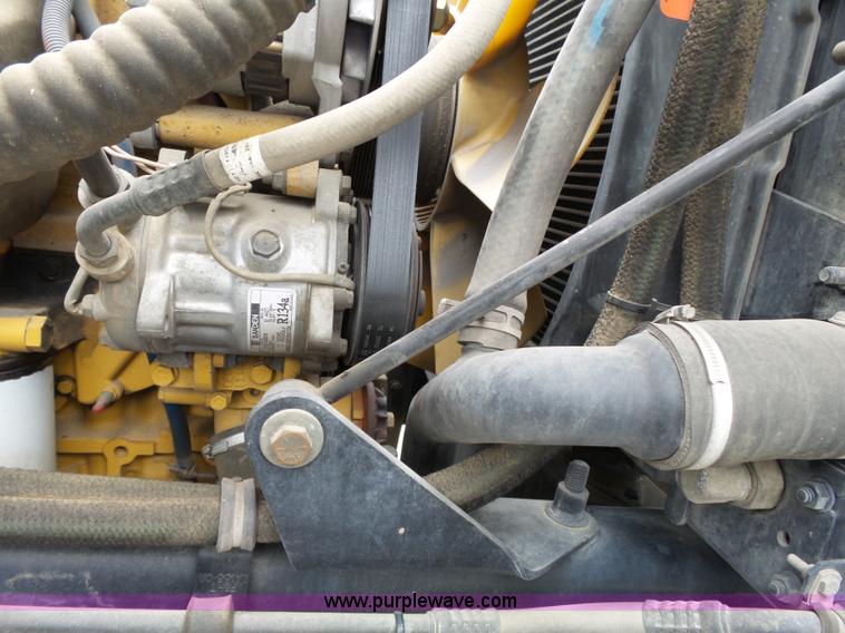 image for item AM9527 2004 Sterling L8500 Acterra Grapple truck