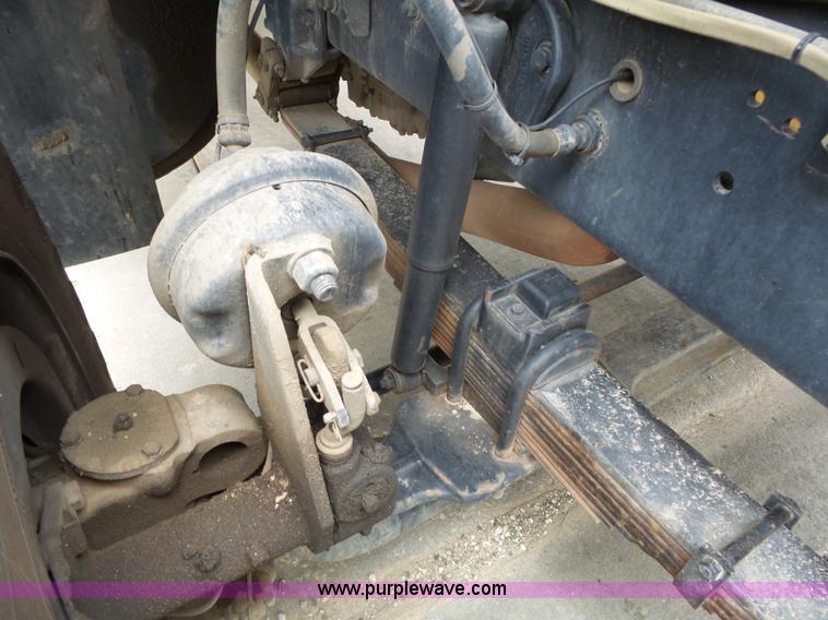 image for item AM9527 2004 Sterling L8500 Acterra Grapple truck