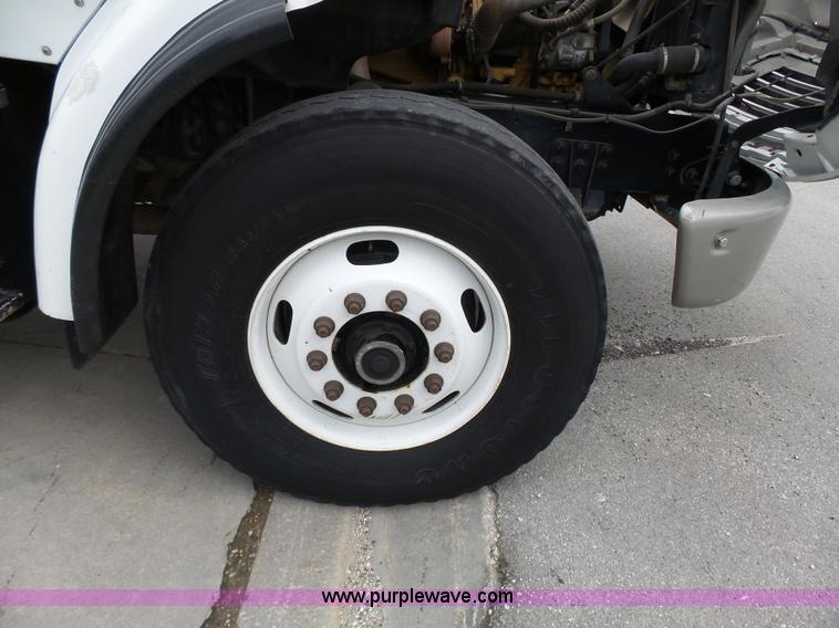 image for item AM9527 2004 Sterling L8500 Acterra Grapple truck