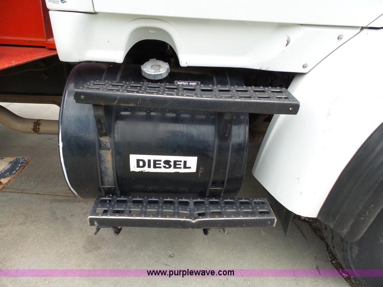 image for item AM9527 2004 Sterling L8500 Acterra Grapple truck