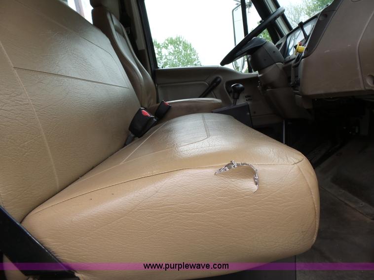 image for item AM9527 2004 Sterling L8500 Acterra Grapple truck