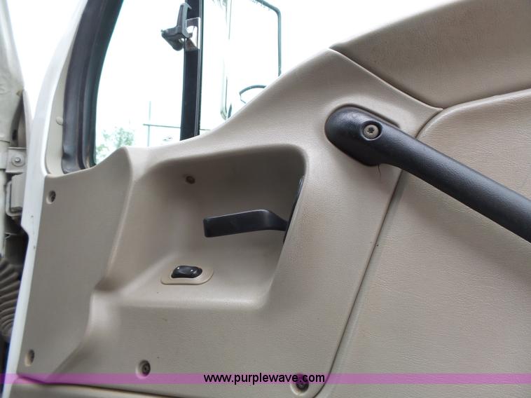 image for item AM9527 2004 Sterling L8500 Acterra Grapple truck