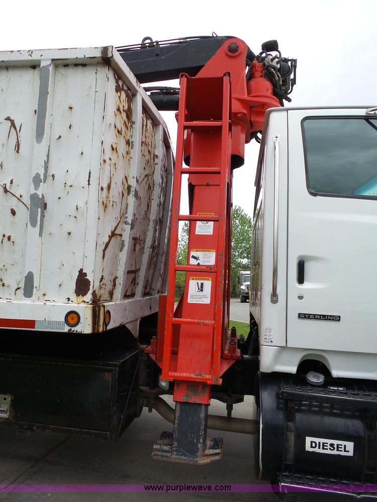 image for item AM9527 2004 Sterling L8500 Acterra Grapple truck