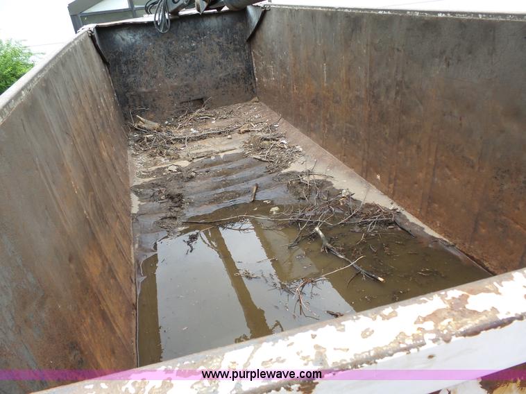 image for item AM9527 2004 Sterling L8500 Acterra Grapple truck