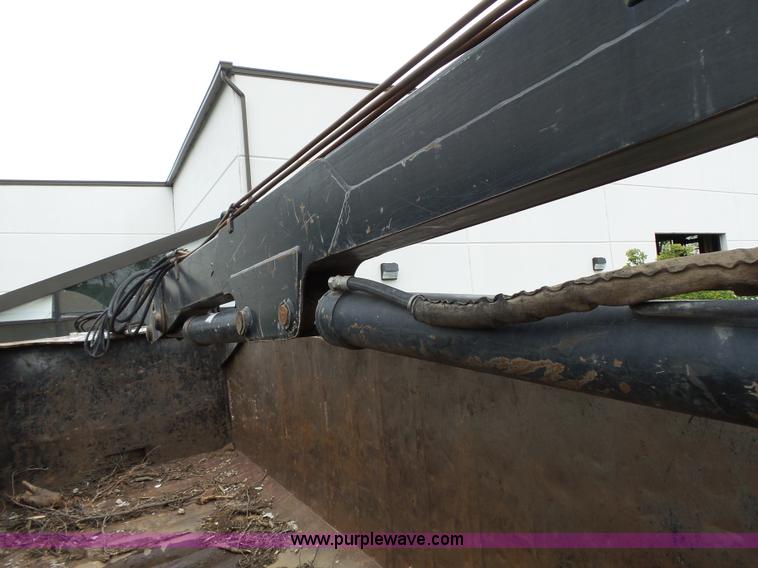 image for item AM9527 2004 Sterling L8500 Acterra Grapple truck