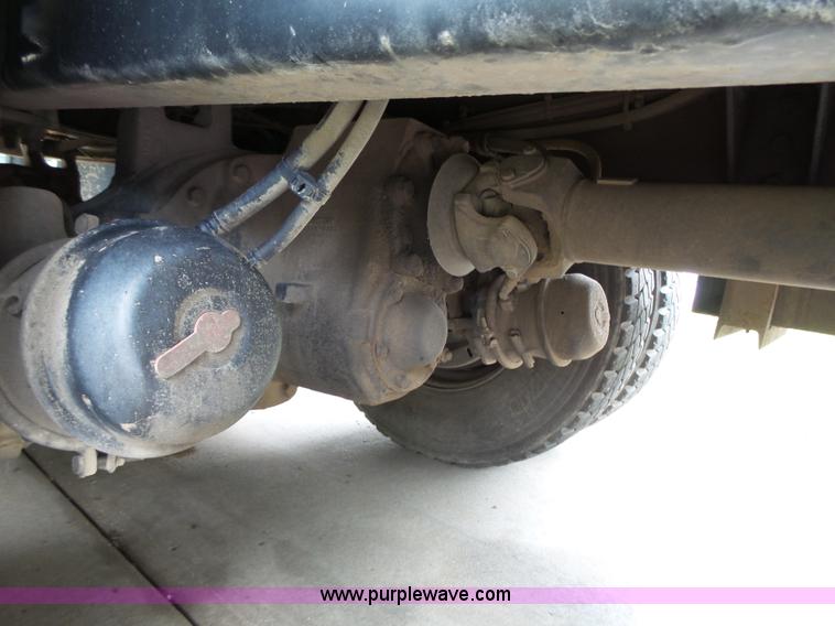 image for item AM9527 2004 Sterling L8500 Acterra Grapple truck