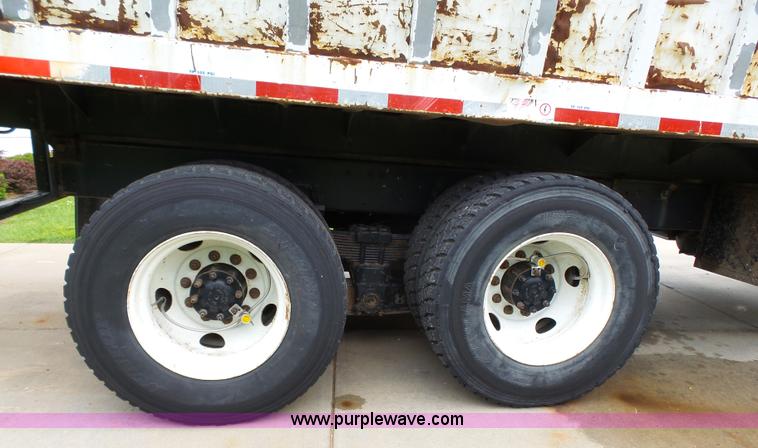 image for item AM9527 2004 Sterling L8500 Acterra Grapple truck