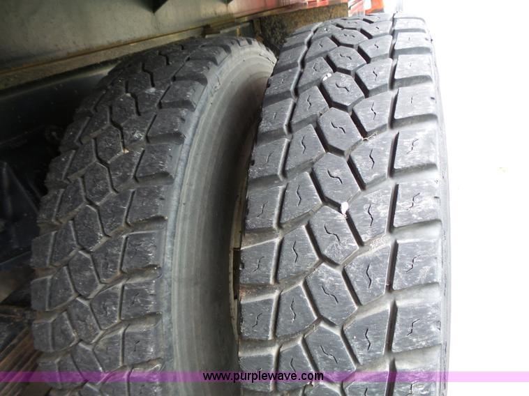 image for item AM9527 2004 Sterling L8500 Acterra Grapple truck