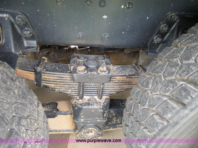 image for item AM9527 2004 Sterling L8500 Acterra Grapple truck