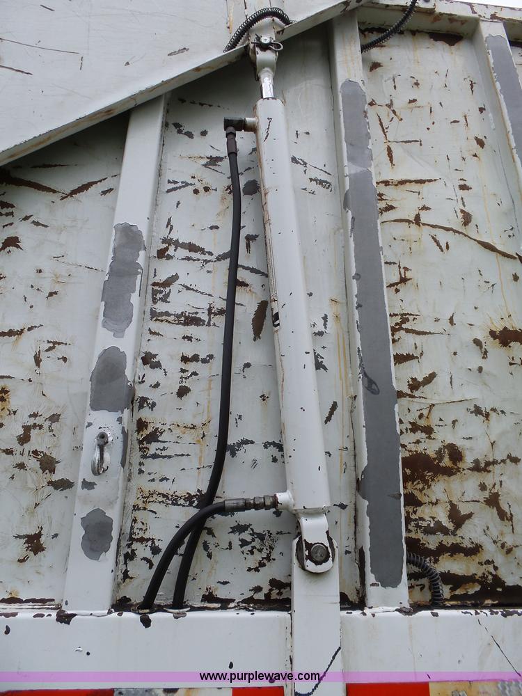 image for item AM9527 2004 Sterling L8500 Acterra Grapple truck