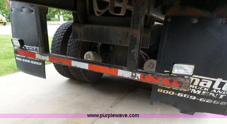 image for item AM9527 2004 Sterling L8500 Acterra Grapple truck