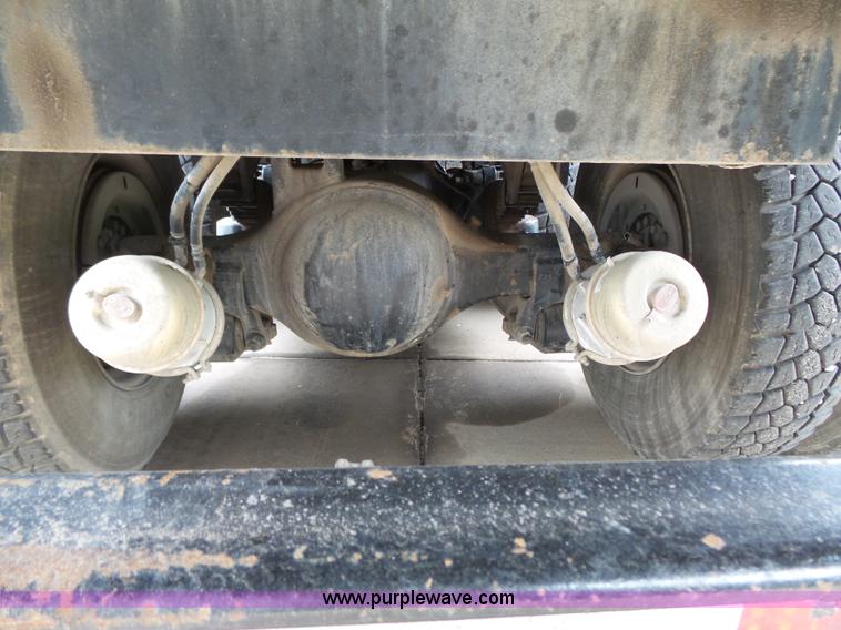 image for item AM9527 2004 Sterling L8500 Acterra Grapple truck