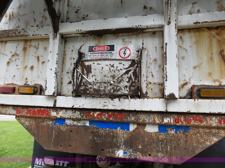 image for item AM9527 2004 Sterling L8500 Acterra Grapple truck