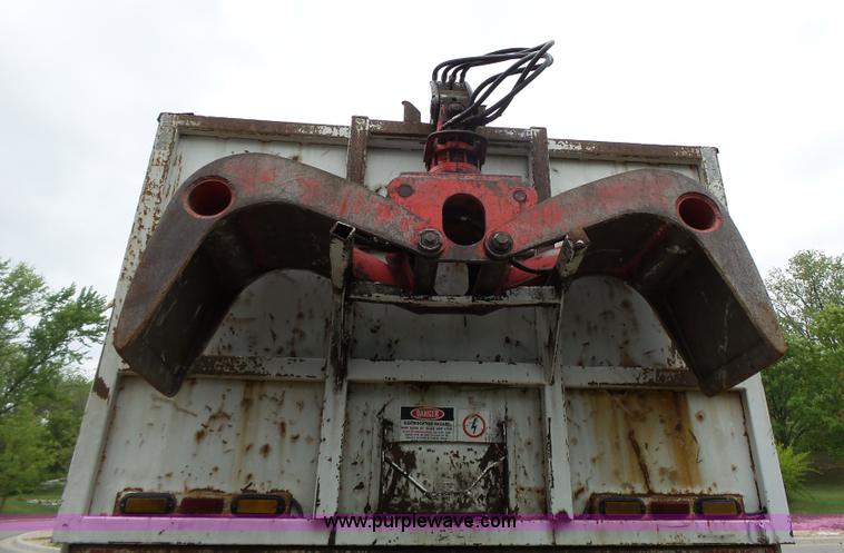 image for item AM9527 2004 Sterling L8500 Acterra Grapple truck