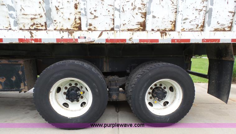 image for item AM9527 2004 Sterling L8500 Acterra Grapple truck