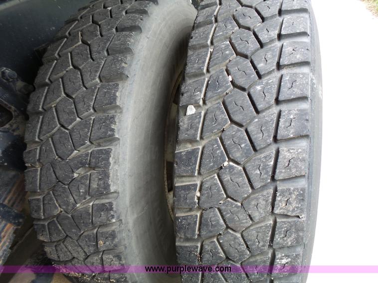 image for item AM9527 2004 Sterling L8500 Acterra Grapple truck