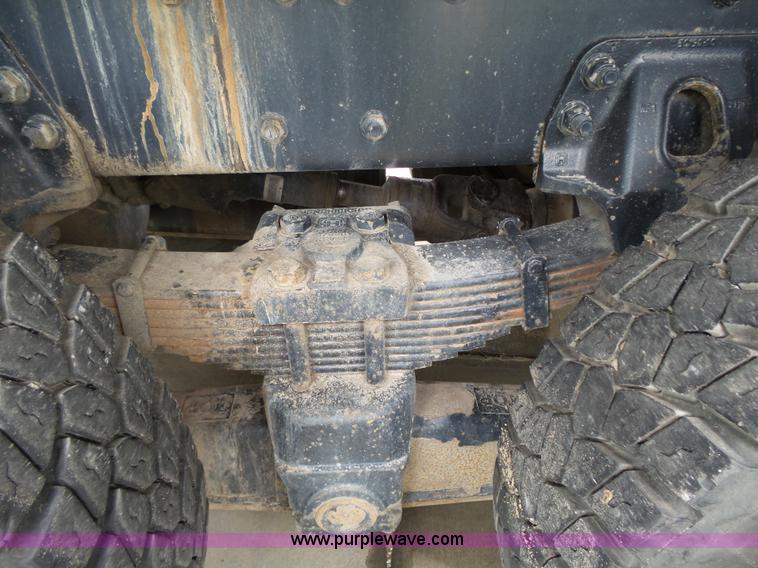 image for item AM9527 2004 Sterling L8500 Acterra Grapple truck