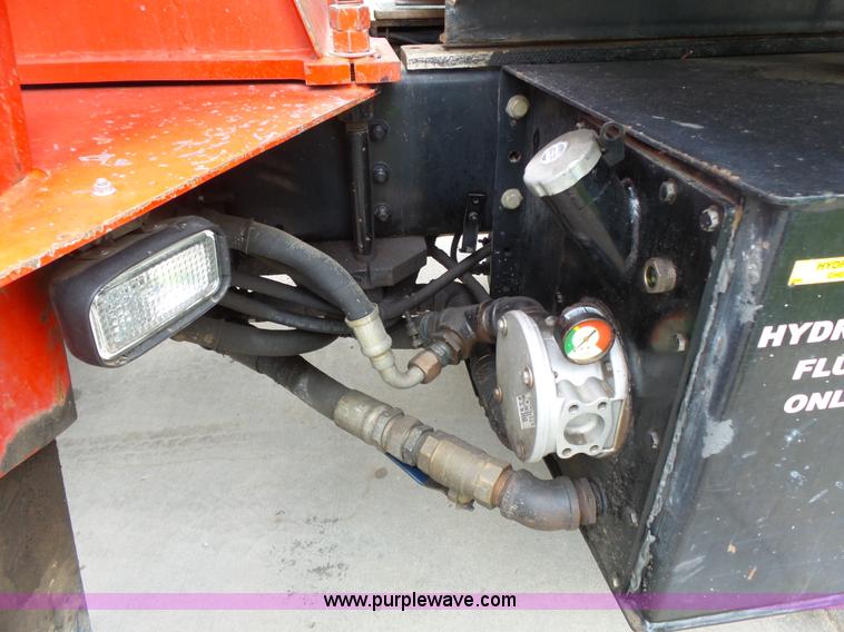 image for item AM9527 2004 Sterling L8500 Acterra Grapple truck