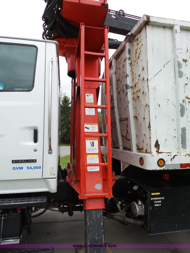 image for item AM9527 2004 Sterling L8500 Acterra Grapple truck