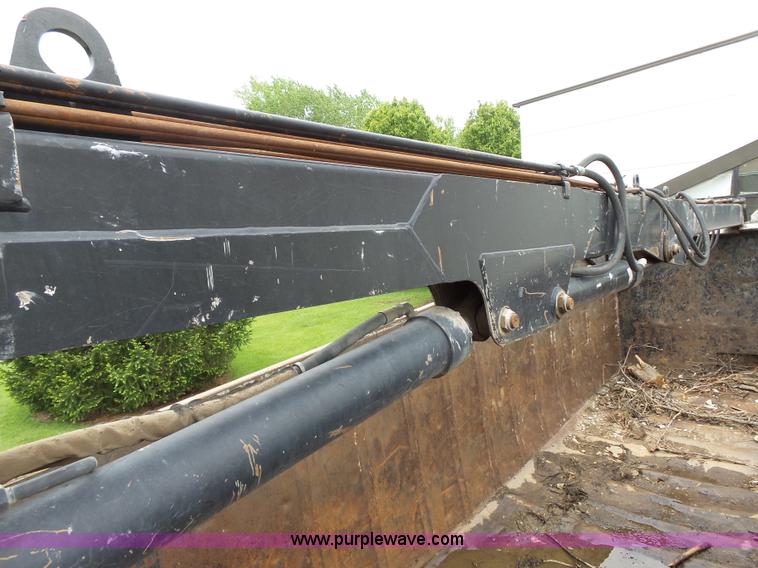 image for item AM9527 2004 Sterling L8500 Acterra Grapple truck