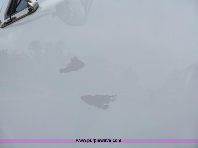 image for item AM9527 2004 Sterling L8500 Acterra Grapple truck