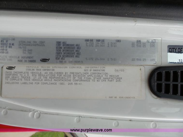 image for item AM9527 2004 Sterling L8500 Acterra Grapple truck