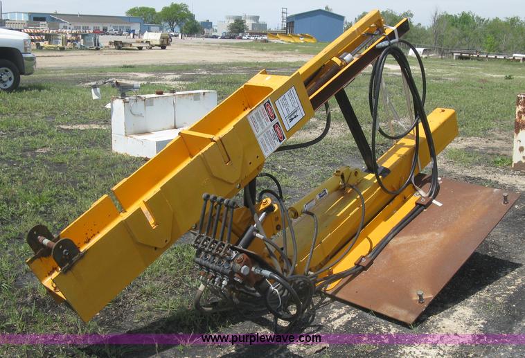 image for item BF9869 Hydraulic guard rail post driver attachment