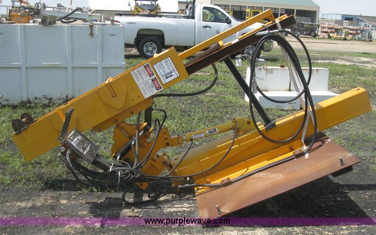 image for item BF9869 Hydraulic guard rail post driver attachment