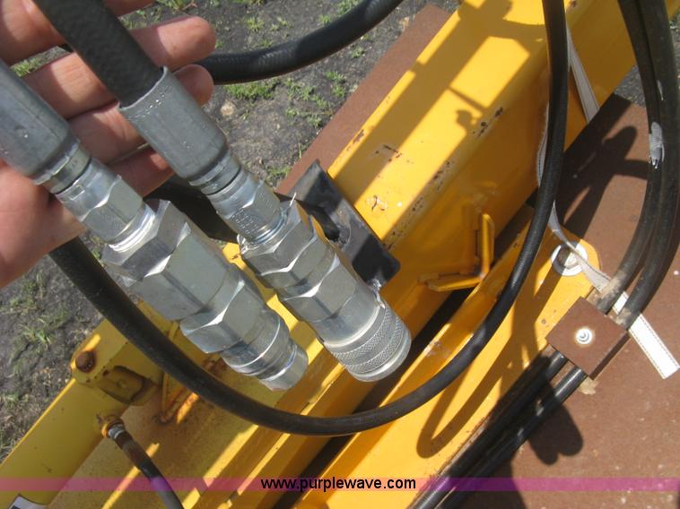 image for item BF9869 Hydraulic guard rail post driver attachment