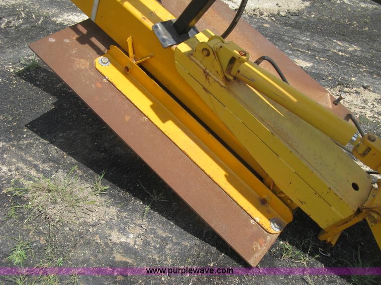 image for item BF9869 Hydraulic guard rail post driver attachment