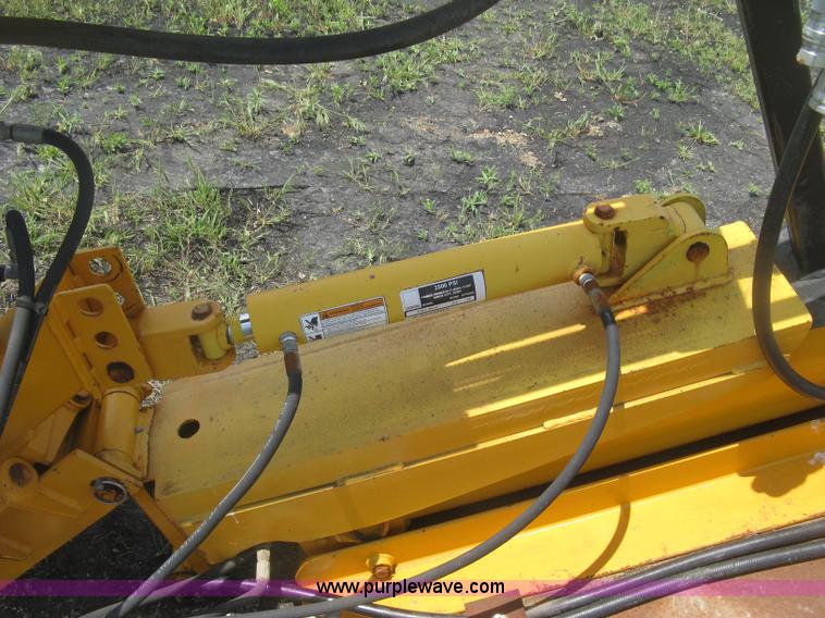 image for item BF9869 Hydraulic guard rail post driver attachment