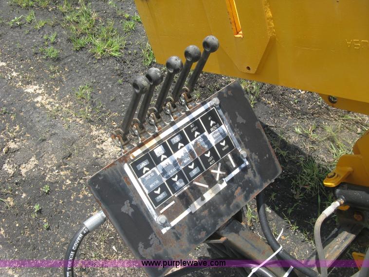 image for item BF9869 Hydraulic guard rail post driver attachment