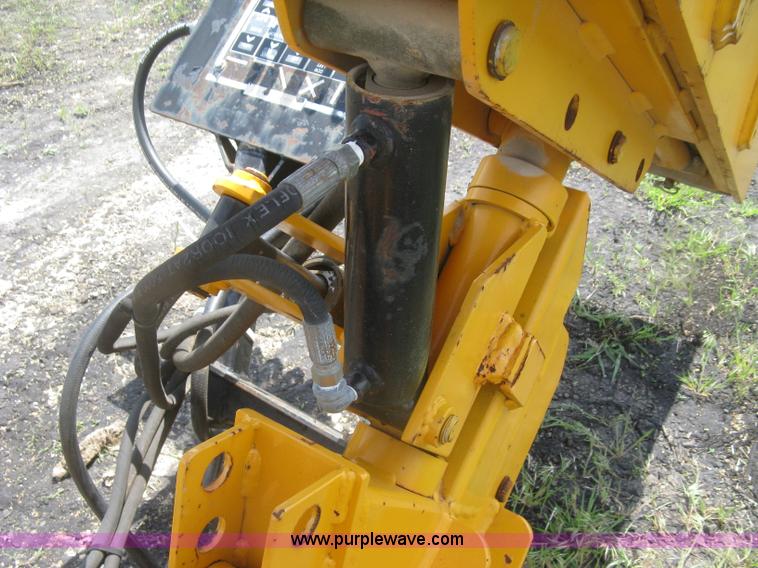 image for item BF9869 Hydraulic guard rail post driver attachment