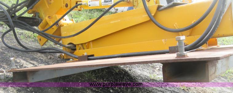 image for item BF9869 Hydraulic guard rail post driver attachment