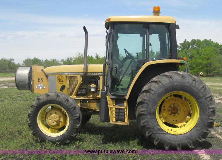 image for item J2805 1996 John Deere 6400 MFWD tractor